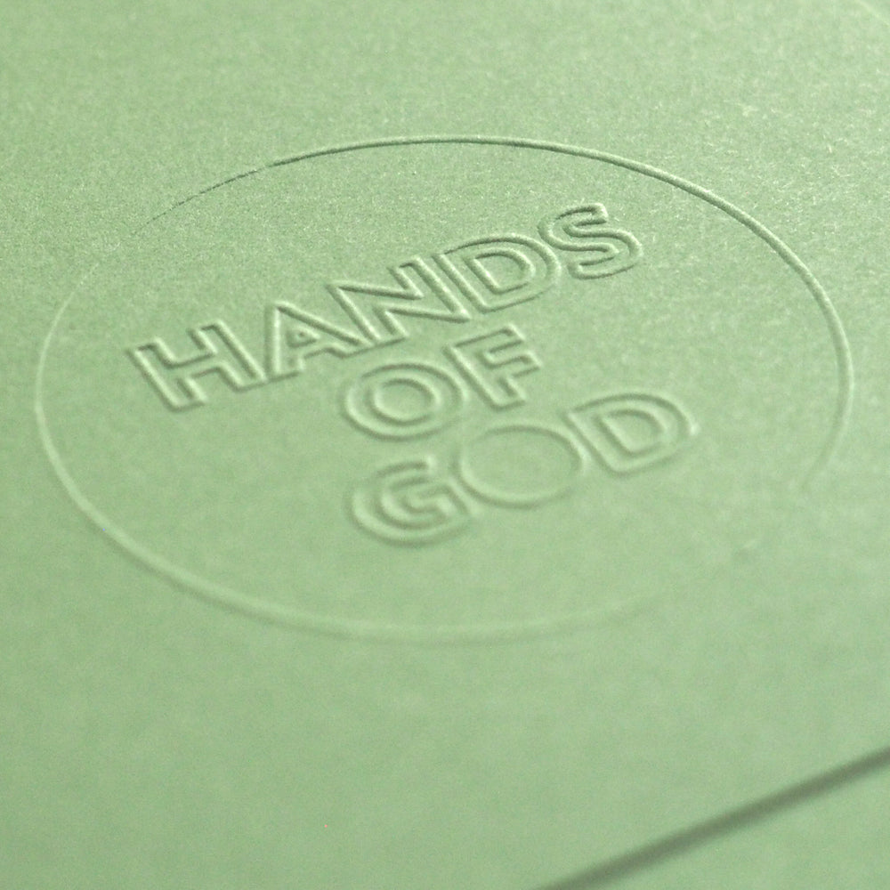 
                  
                    Hands of God Logo print on paper
                  
                